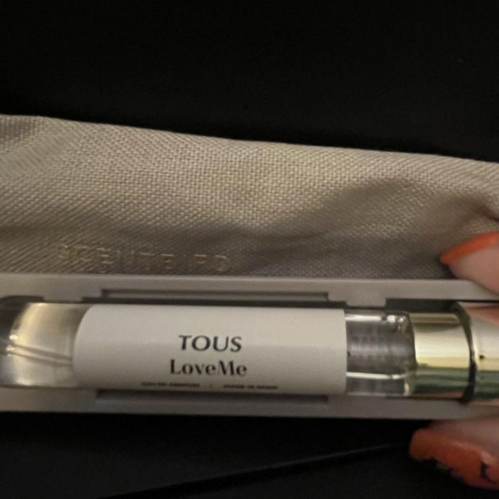 Tous Love Me perfume in atomizer case